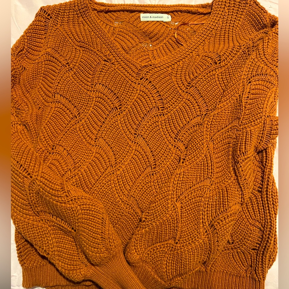 Rich brown sweater, light, and slightly see through, long sleeve, size small.